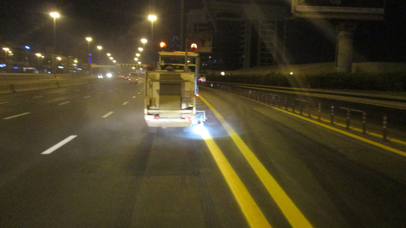 Machine Road Marking at Night, Thermoplastic Paint Double Solid Yellow Lines, Dubai