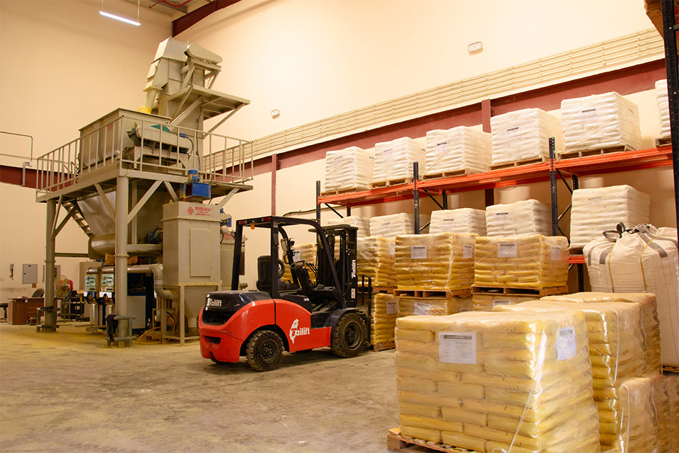 Byblos Roads Marking Thermoplastic Paint Factory, Showing Mixing Machine and Forklift with Bags on Pallets